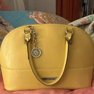 Anne Klein Yellow Satchel with Lion Charm
